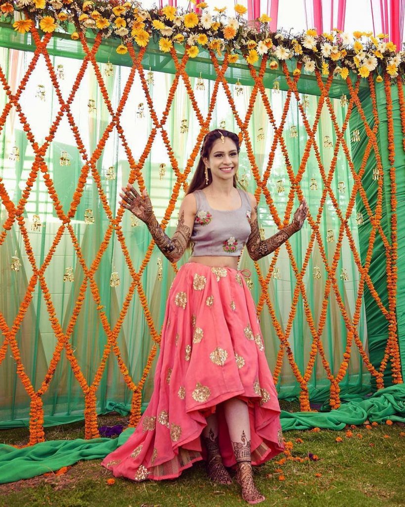 Marigold decoration with green accents for mehndi function