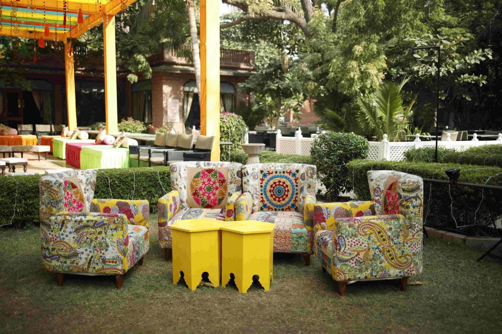 bohomian style seating arrangement in yellow colour palette as mehendi decoration ideas