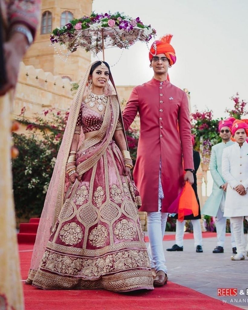 dulhan entry idea with a floral umbrella