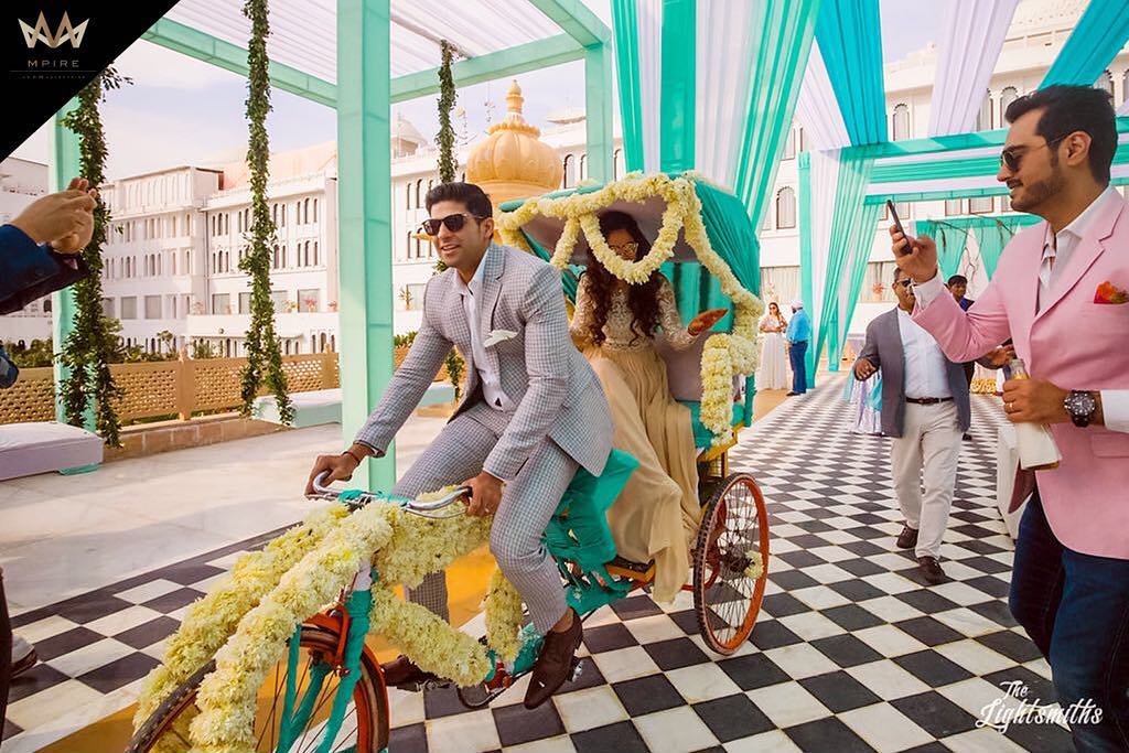 Fun Rickshaw bride and groom entry for sangeet