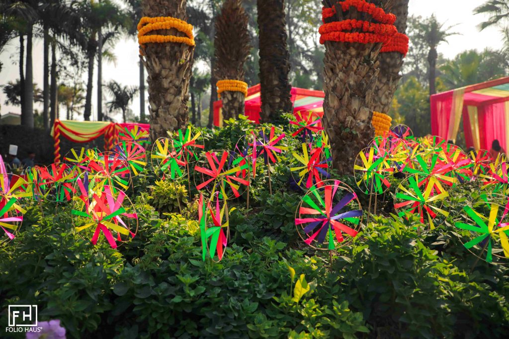 Garden decorated with marigold flowers and pinwheels