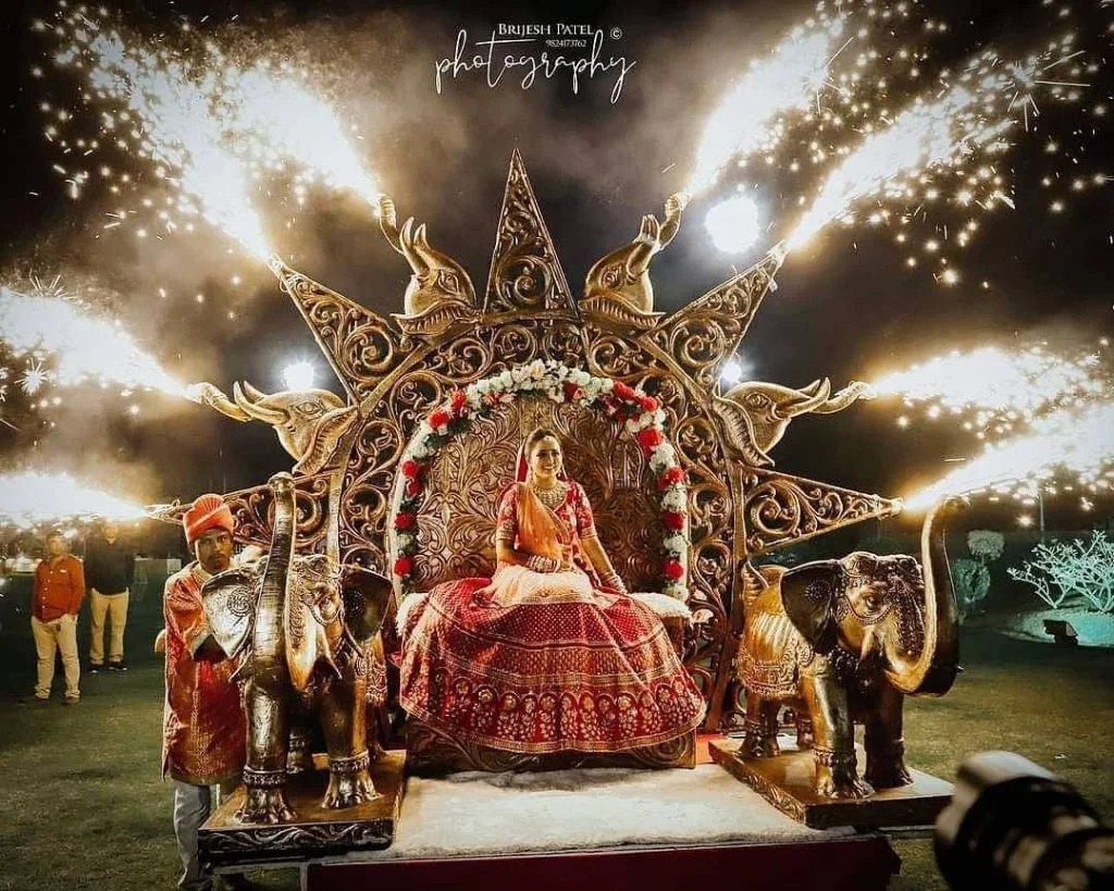 Grand bridal entry idea with royal carriage and fireworks