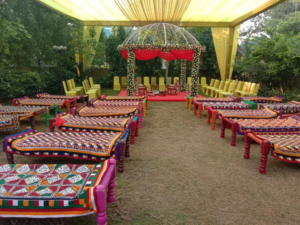 khats decorated in traditional prints as seating arrangement 