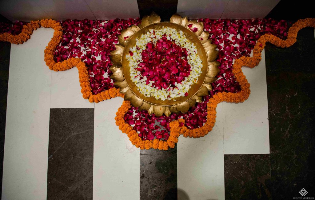 indoor mehndi decoration with roses and marigolds