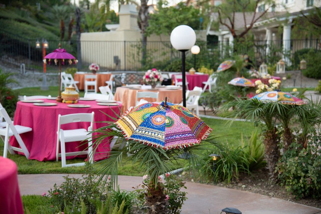 Pink garden decoration with quirky umbrellas