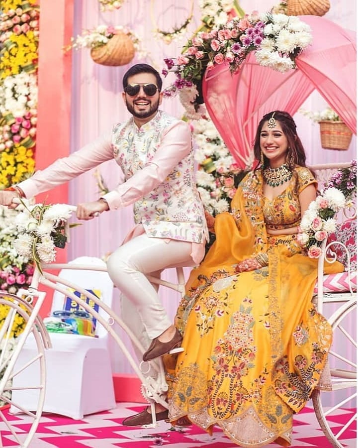 bridal entry idea with groom on a rickshaw