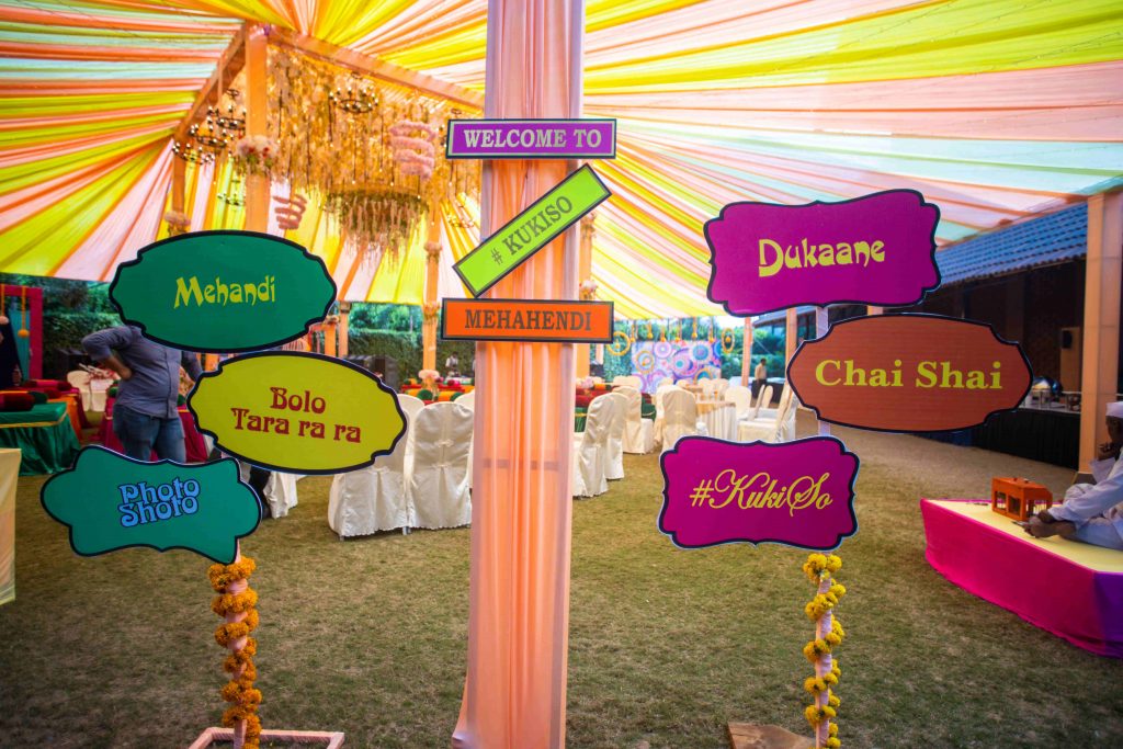 multicolor signboards with directions as mehendi decoration ideas