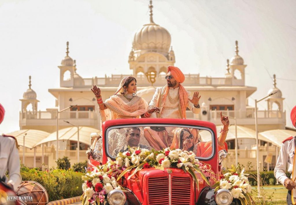 Floral and quirky vintage car bride and groom entry theme