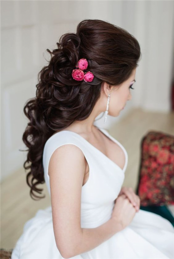 bridal hairstyle decorated with tiny roses