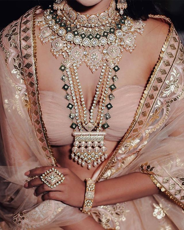 Matching meenakari jewellery with pastel pink lehenga