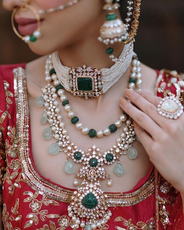 Layered indian bridal Jewellery with varying necklace types