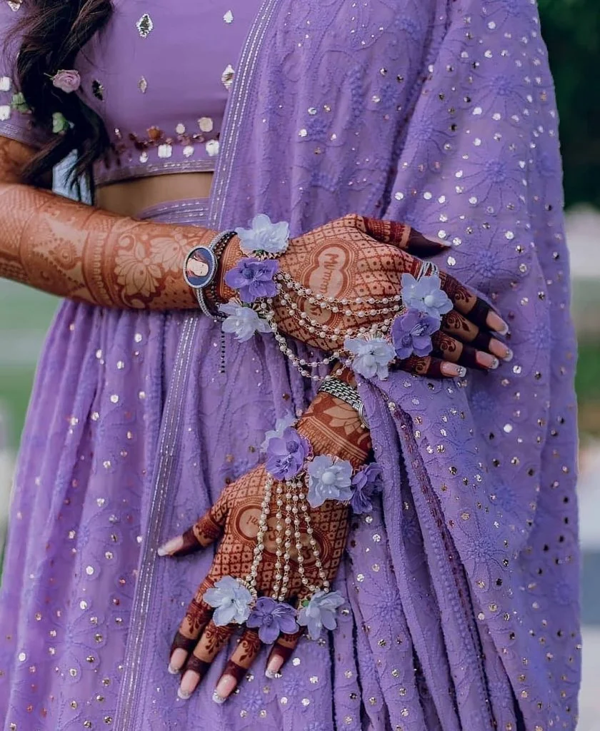Lavender hued floral hathphool for haldi ceremony