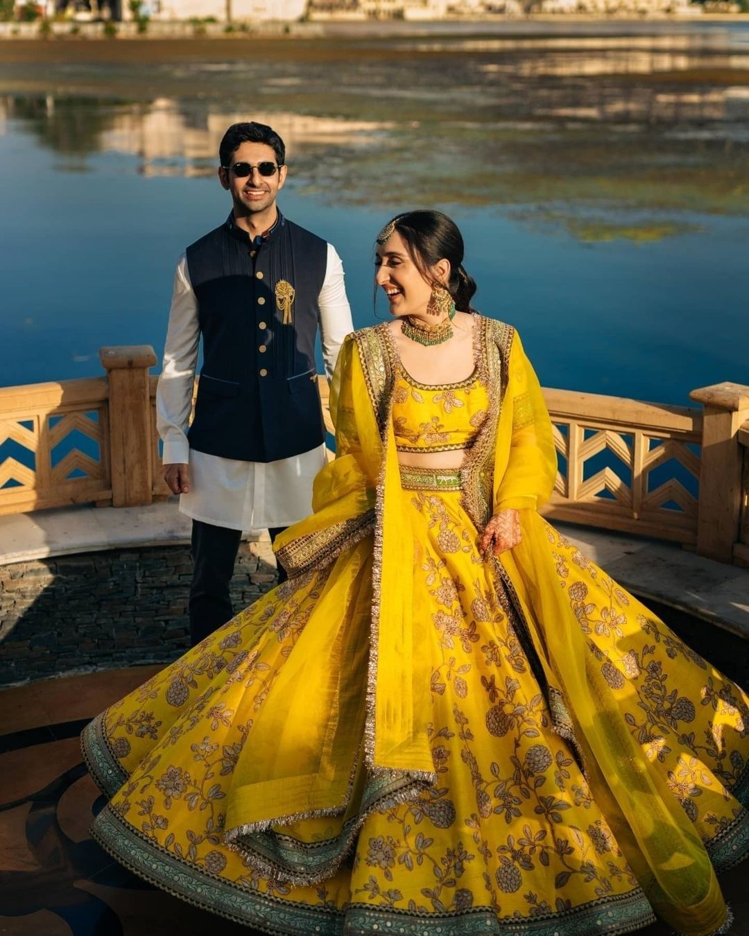 yellow floral engagement dress for bride and kurta for groom 
