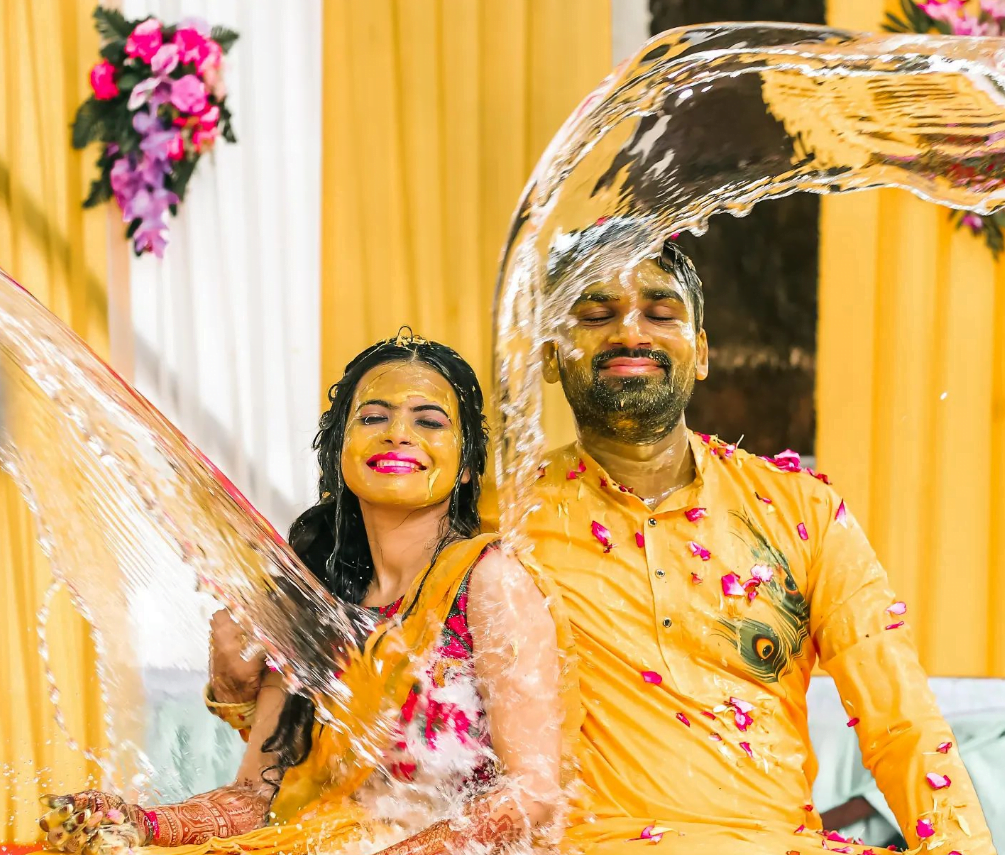 Haldi photoshoot poses - dulha dulhan pose