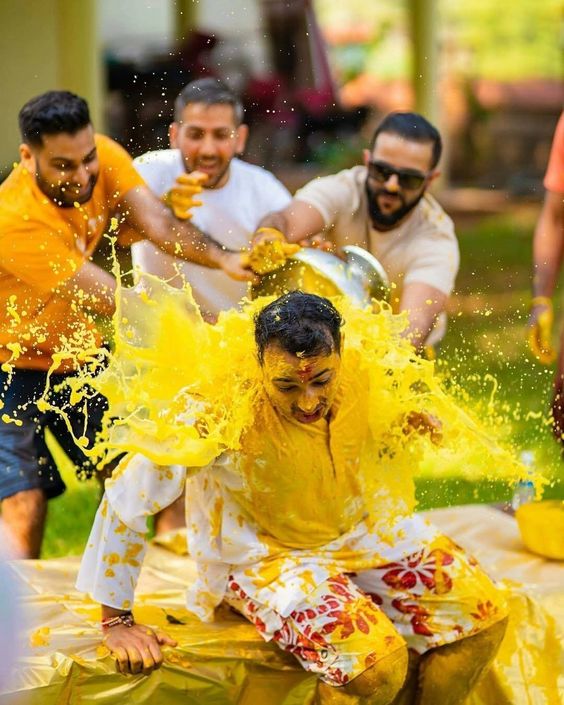 Haldi photoshoot poses for groom with friends