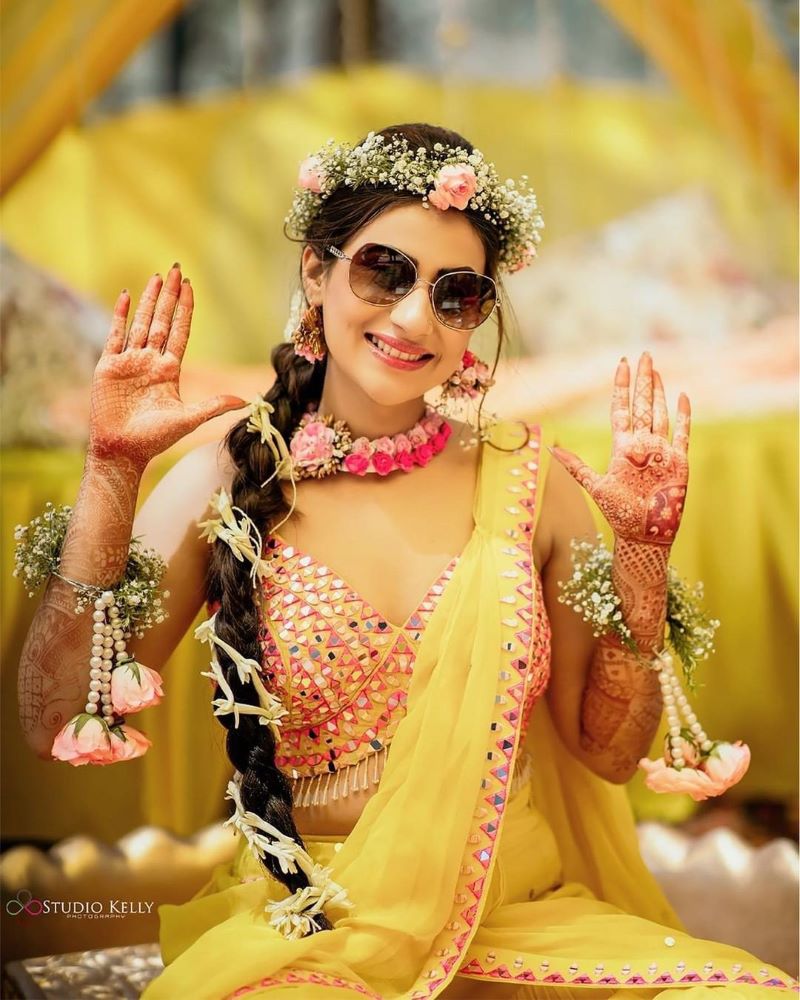 Haldi photoshoot poses for solo bride with Mehendi