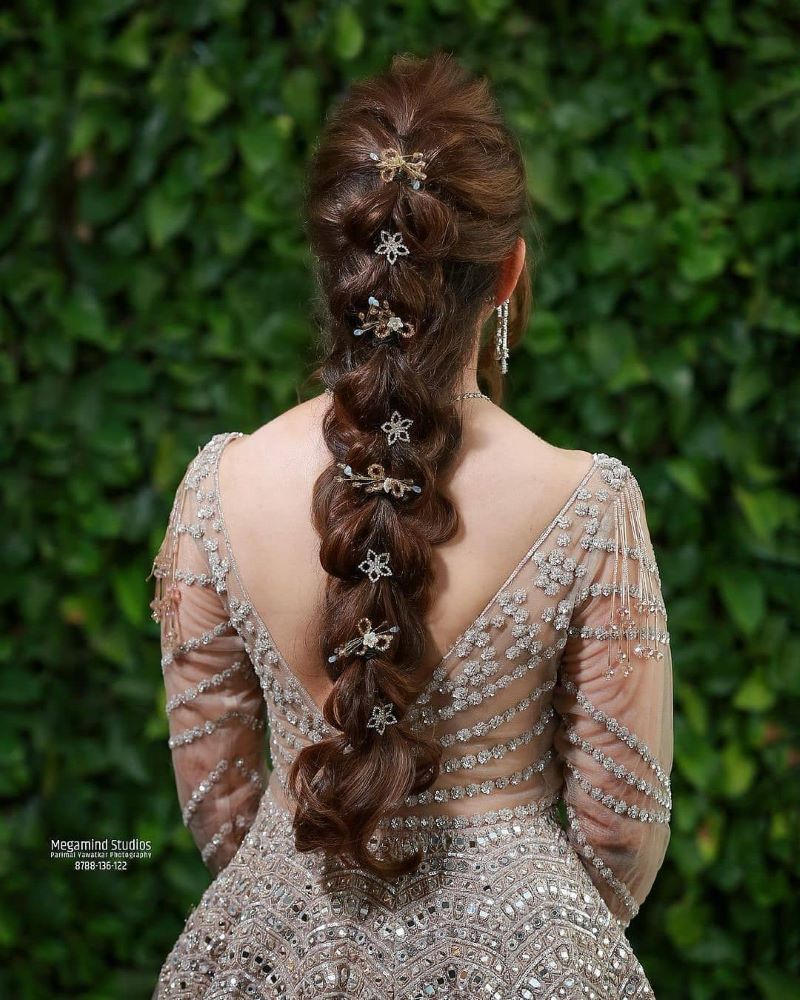 Premium Photo | Bride with a beautiful hairstyle for long hair in a white  dress stands back