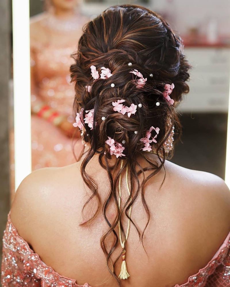 messy bun hairstyle for gown