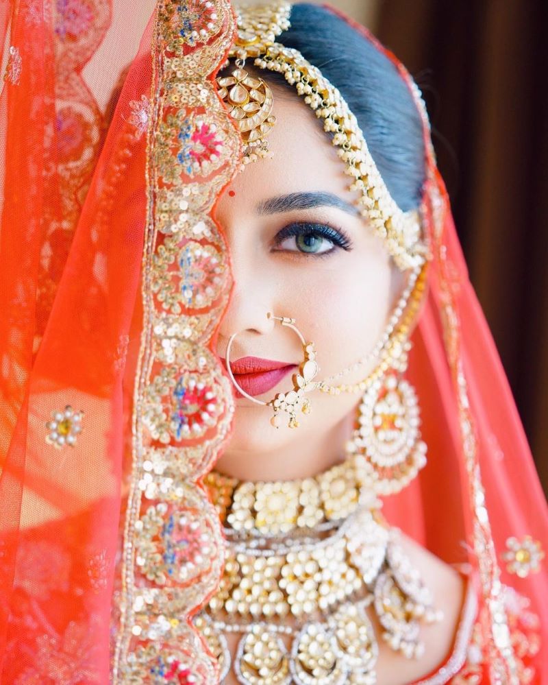 Indian bridal photoshoot poses with dupatta