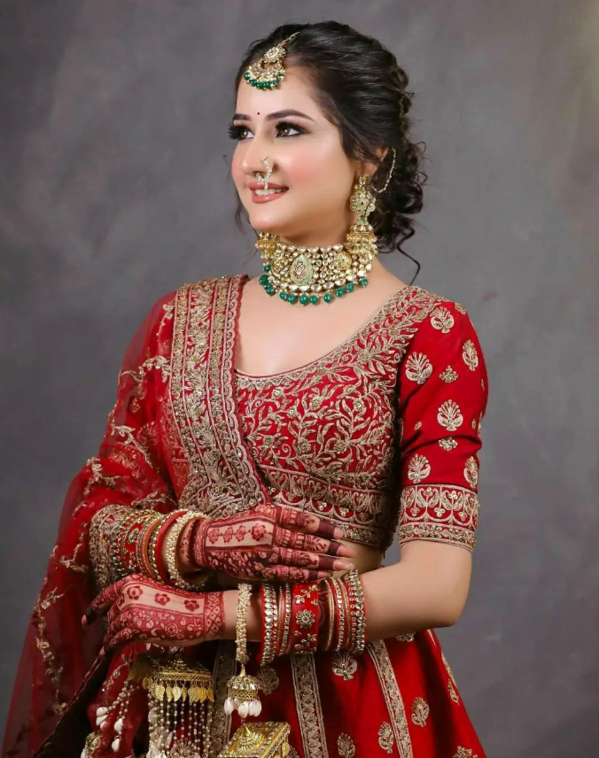 Beautiful Indian Bride In Traditional Hindu Wedding Attire With Lehnga,  Bridal Bangles And Shy Pose Stock Photo, Picture and Royalty Free Image.  Image 143085389.