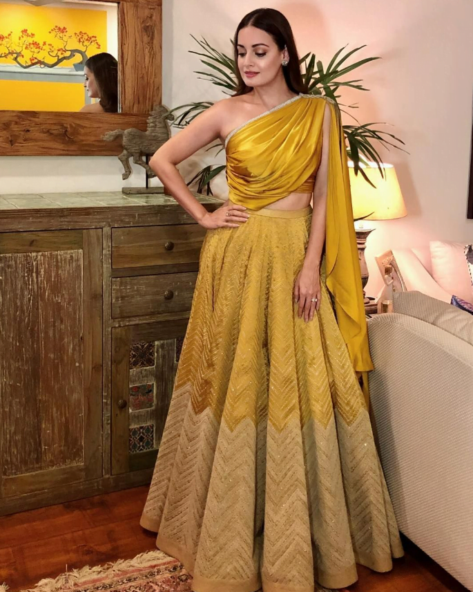 trendy one-shoulder indo western haldi dress for bride 