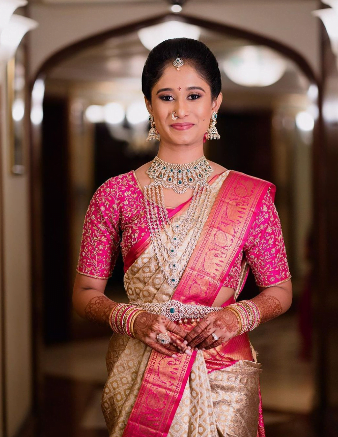 south indian white wedding saree with pink blouse