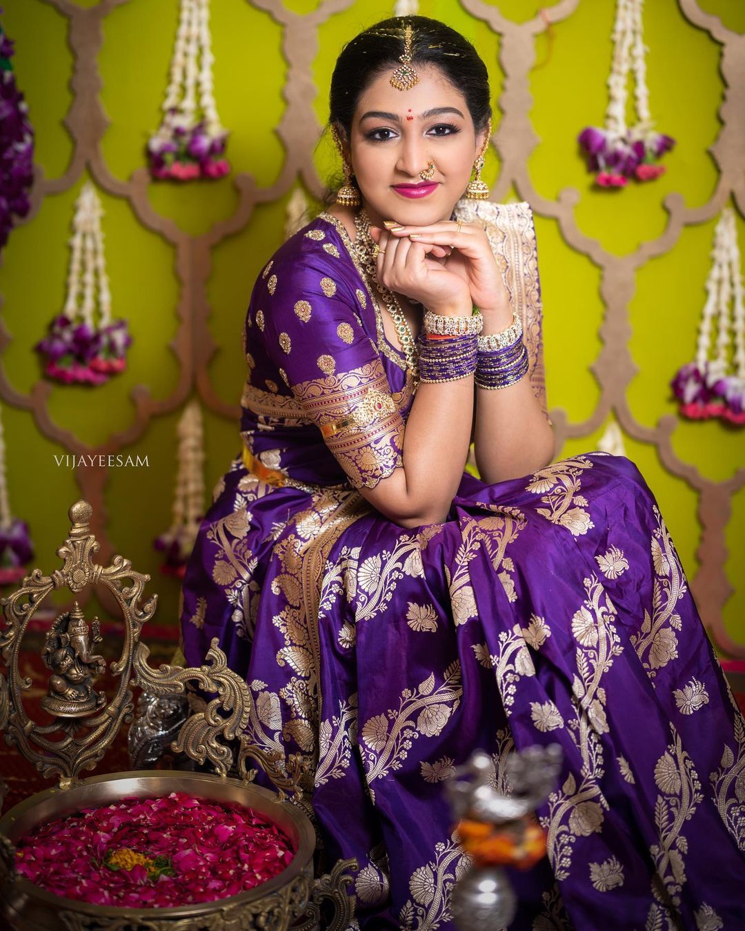 south indian bride in traditional purple silk saree