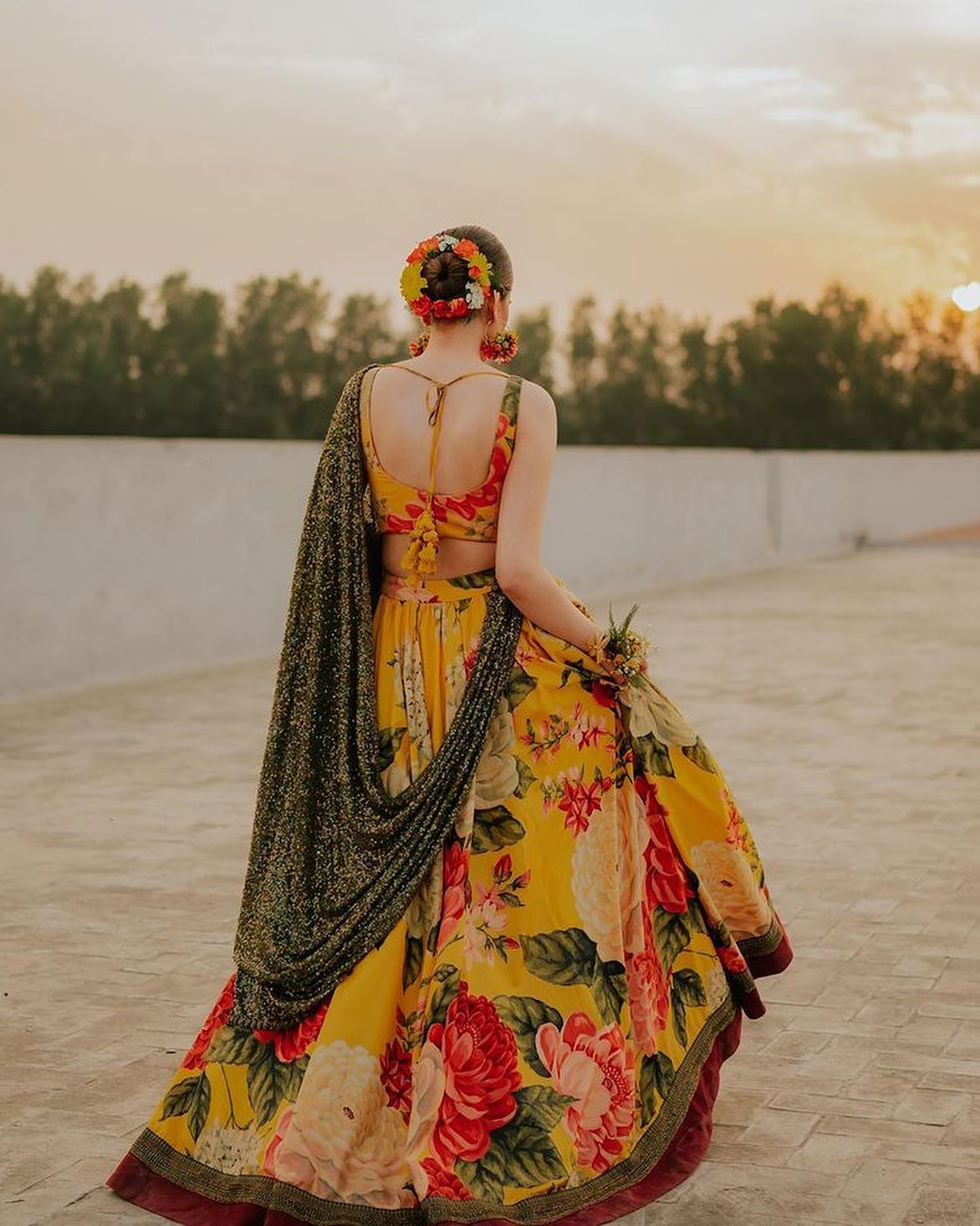 Sabyasachi yellow and green floral bridal lehenga for haldi