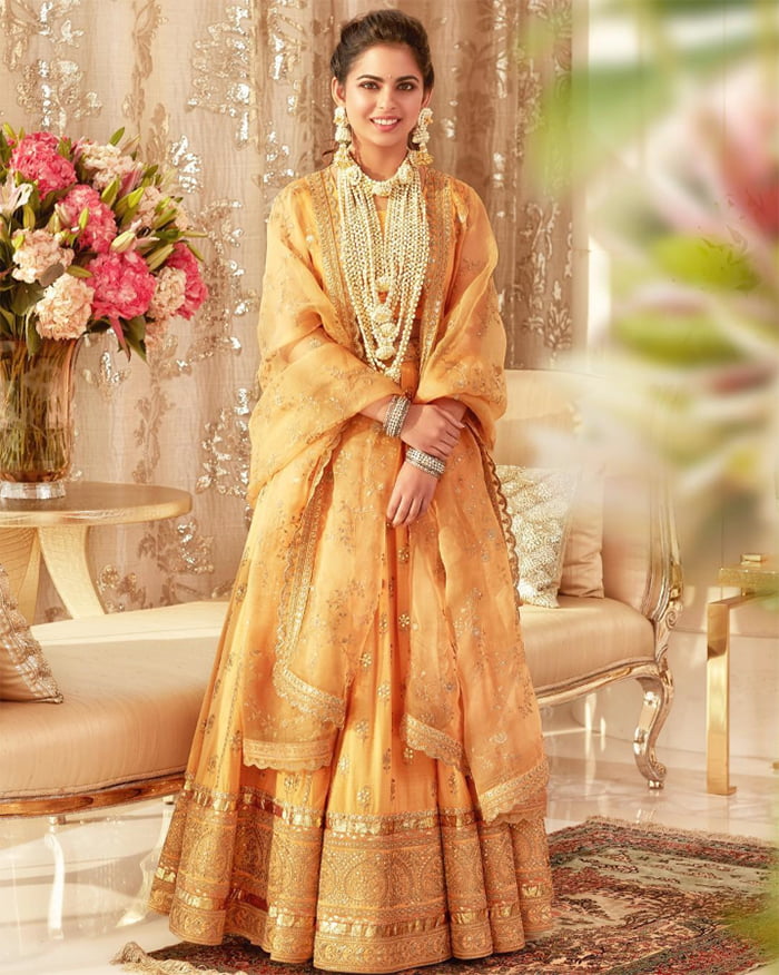 sabyasachi designer haldi lehenga choli with golden zari work