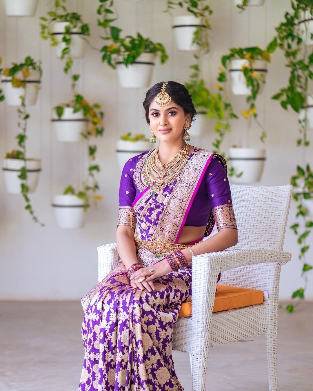 south indian engagement bride in purple pattu saree