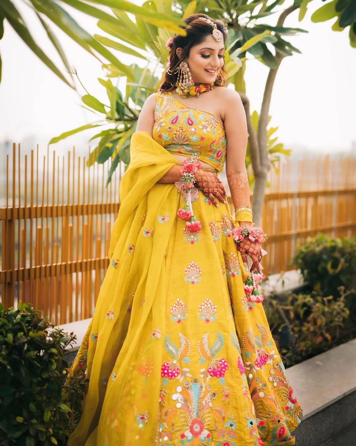 yellow embroidered haldi lehenga choli for bride