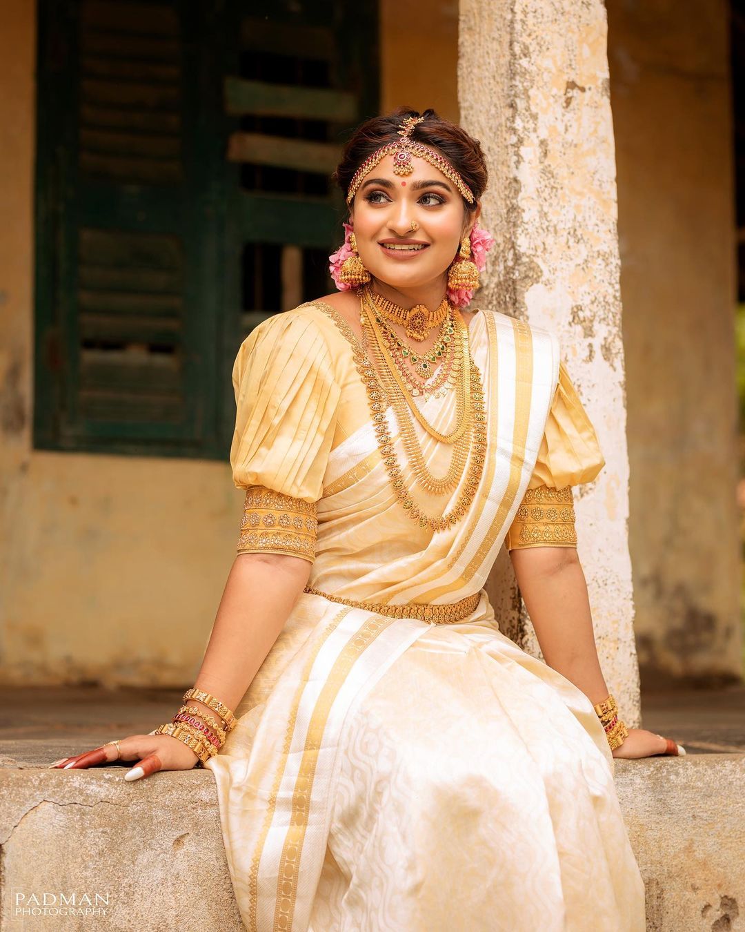 traditional and simple white and golden Telugu sari 