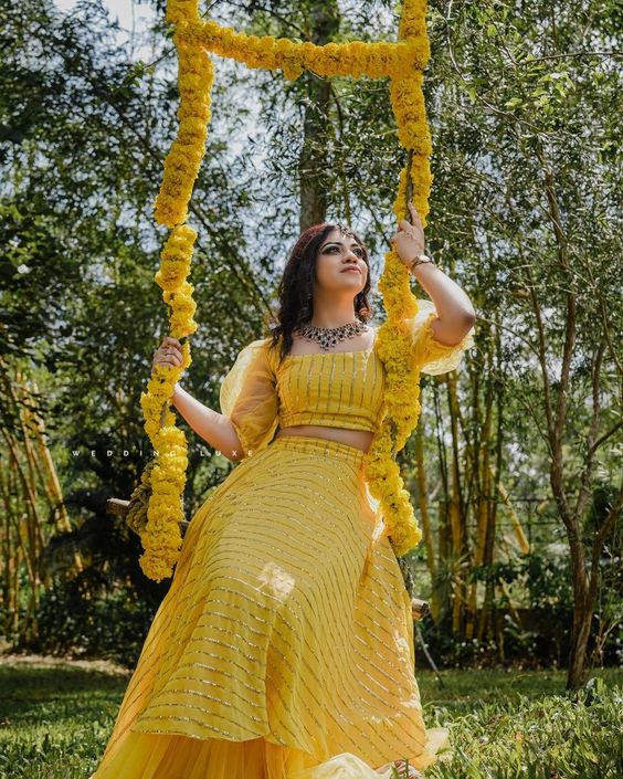 stylish yellow skirt top haldi ceremony outfit for bride