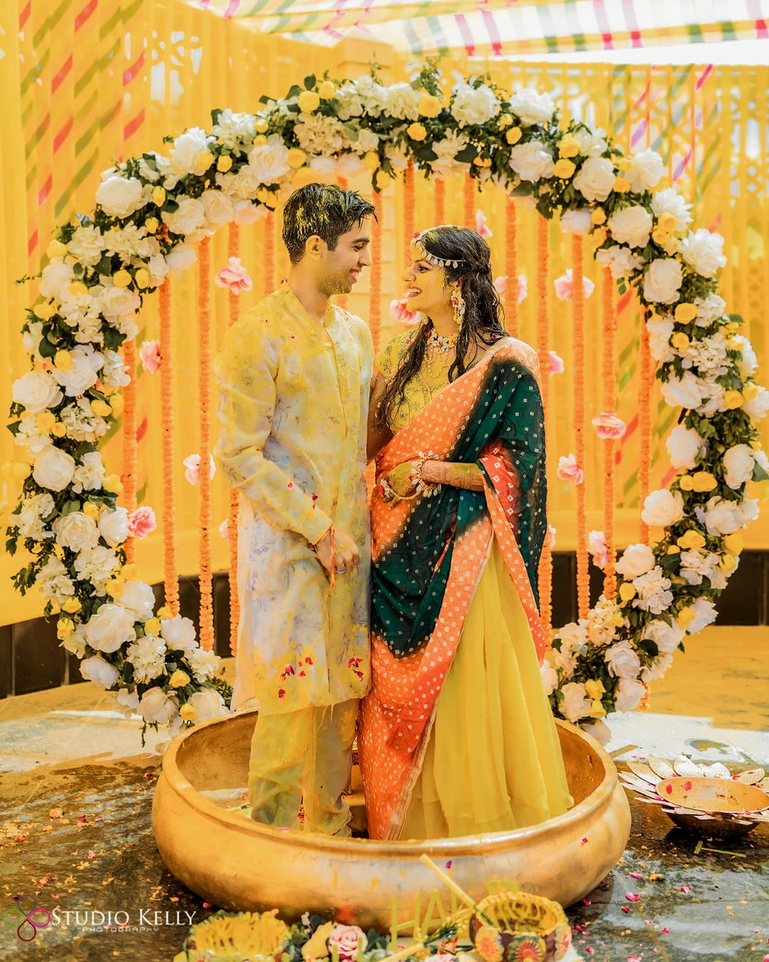 white and yellow floral backdrop haldi ceremony decoration for couple