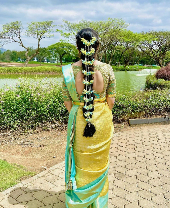 engagement hairstyle on south Indian saree for round face