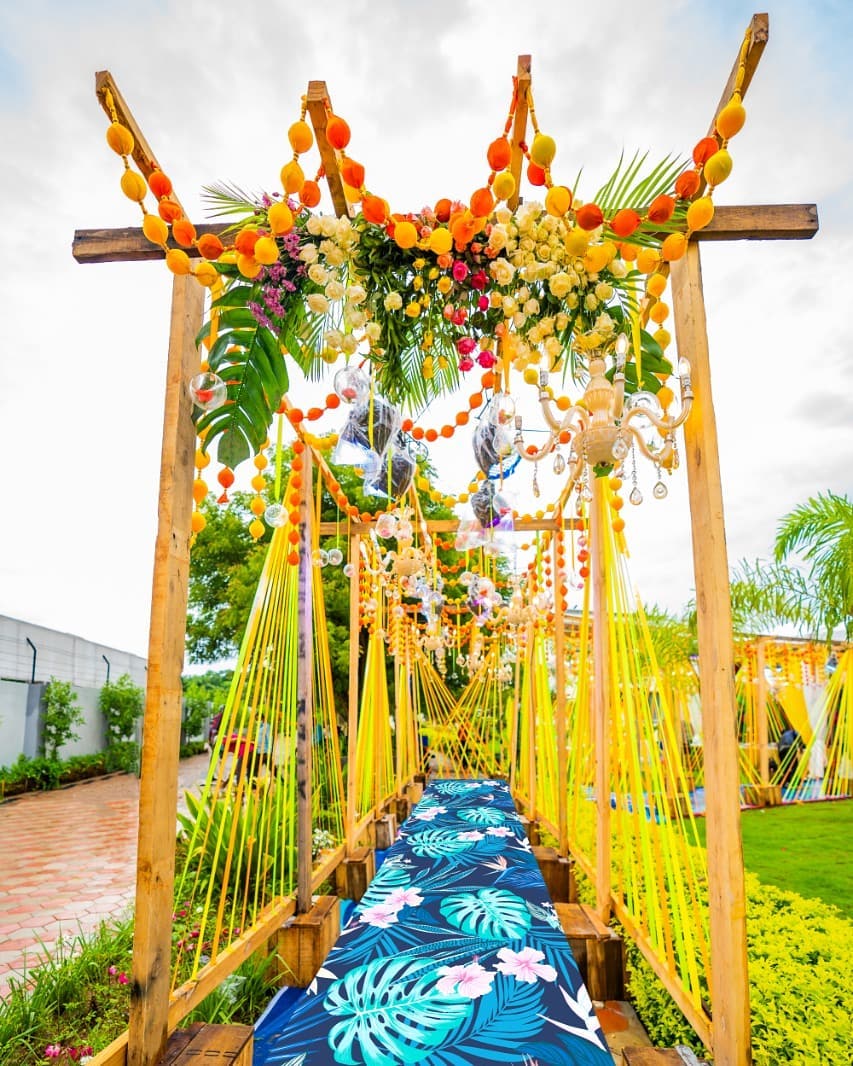 colourful entrance decoration for haldi and mehndi function