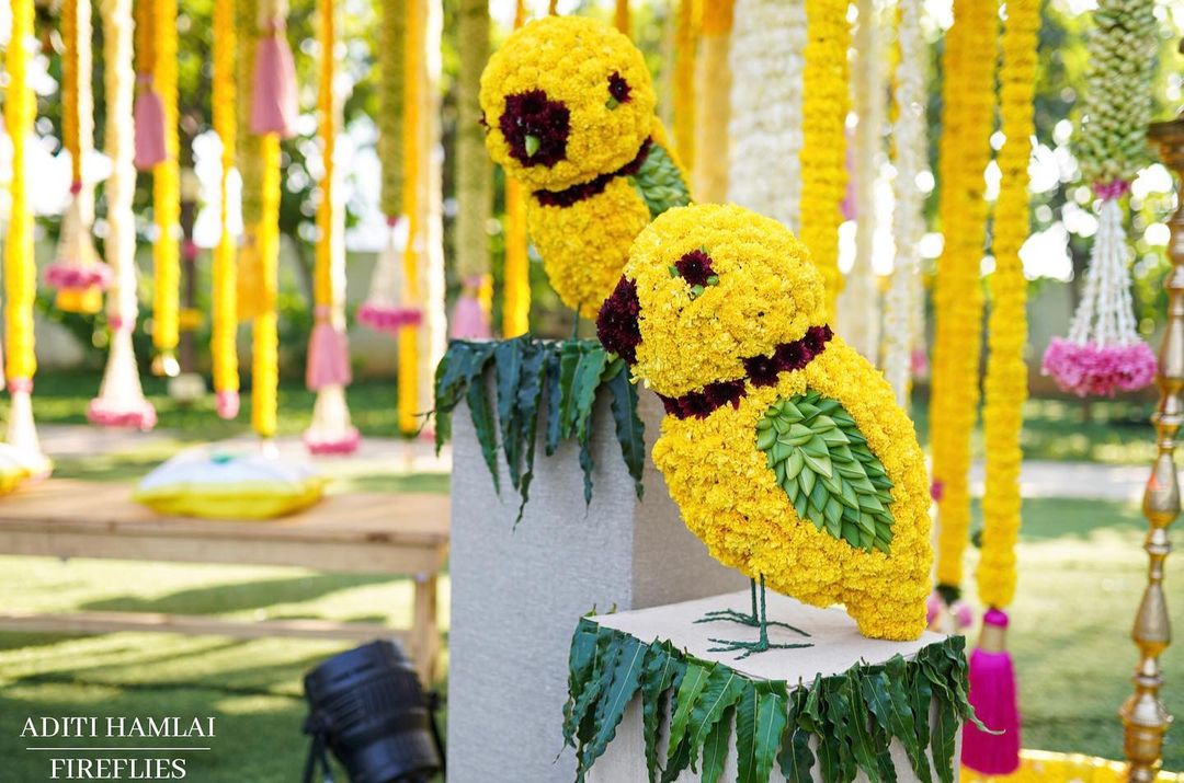 yellow flower bird haldi entrance decoration
