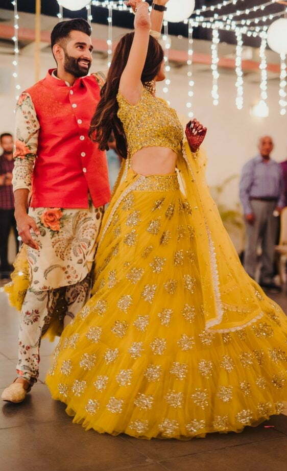 contrast haldi outfits for bride and groom