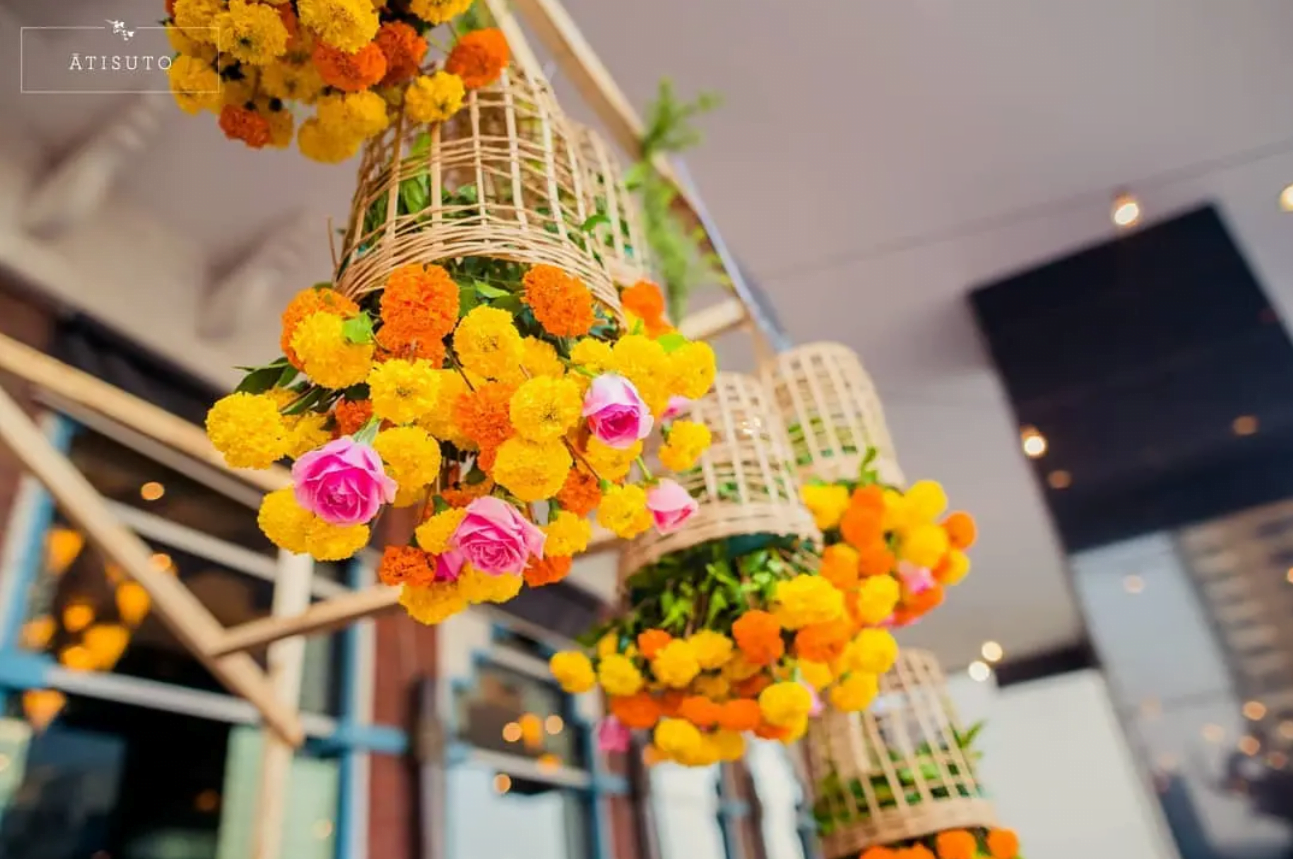 low cost, simple, & unique, hanging marigold basket indoor Haldi decoration ideas