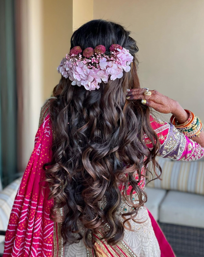 reception bridal hairstyle for south Indian bride curly hair