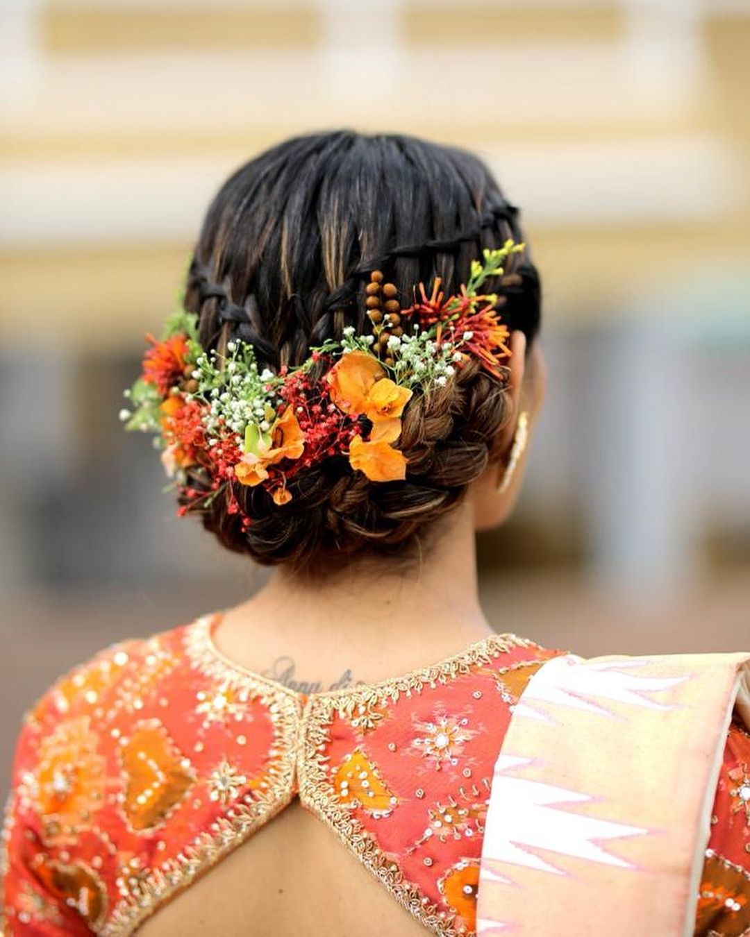 Simple messy bun hairstyle in focus of bollywood actress hema malini with a  , side view, beautiful bun, hyper realistic , extremely realistic hair,  dslr, hd, 4k, extremely details, intricate details, bun