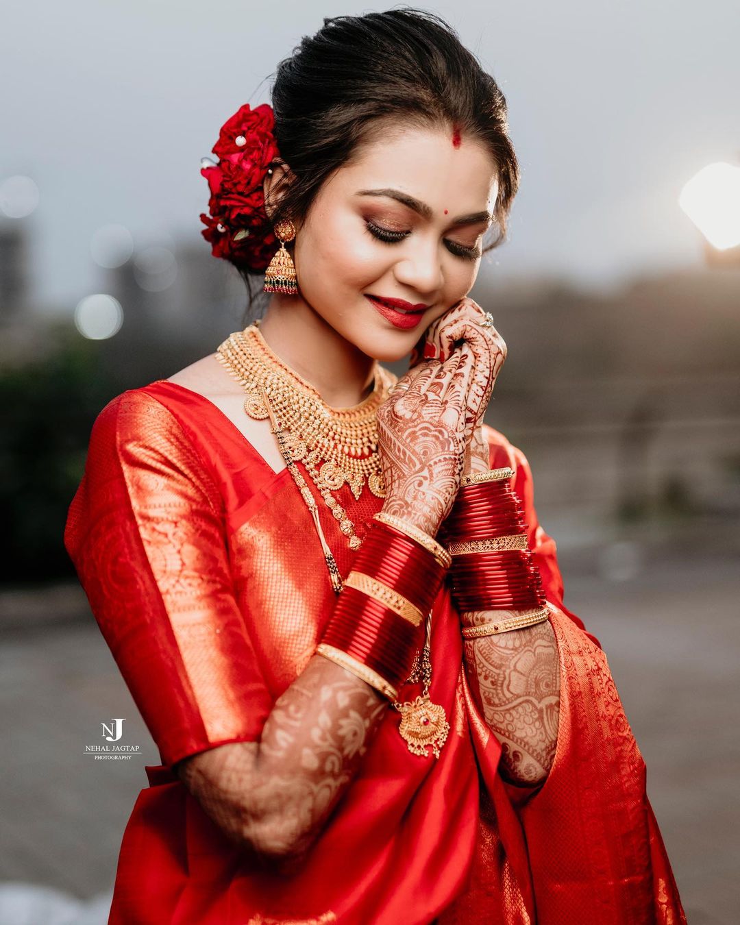 Bengali-traditional-red-engagement-makeup-look-in-saree-engagement -makeup-and-hairstyle-Bengali-engagement-makeup-for-bride | WedAbout