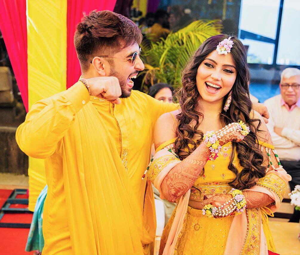 Haldi photoshoot poses for bride and groom candid