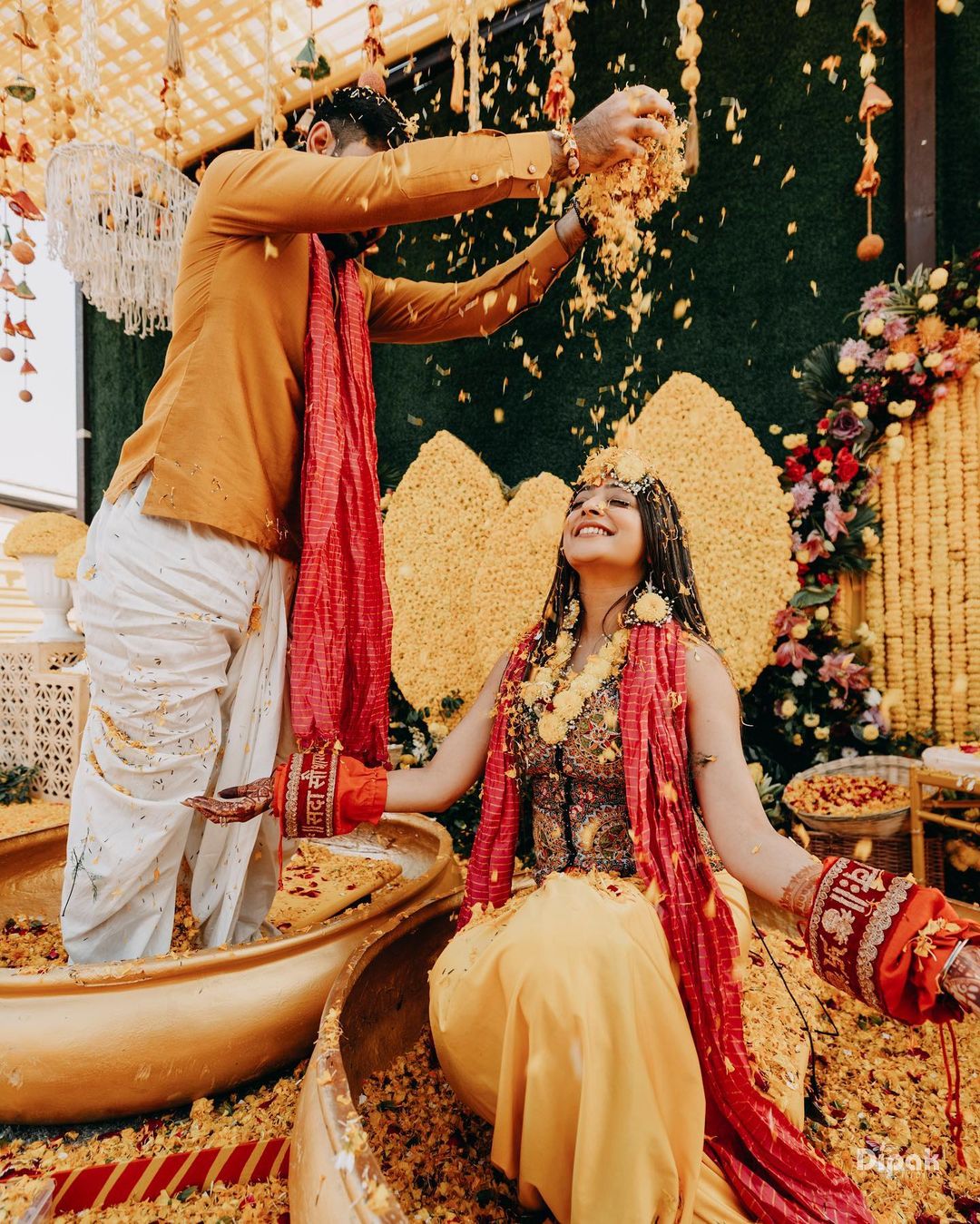 Haldi photoshoot poses for bride and groom candid shot