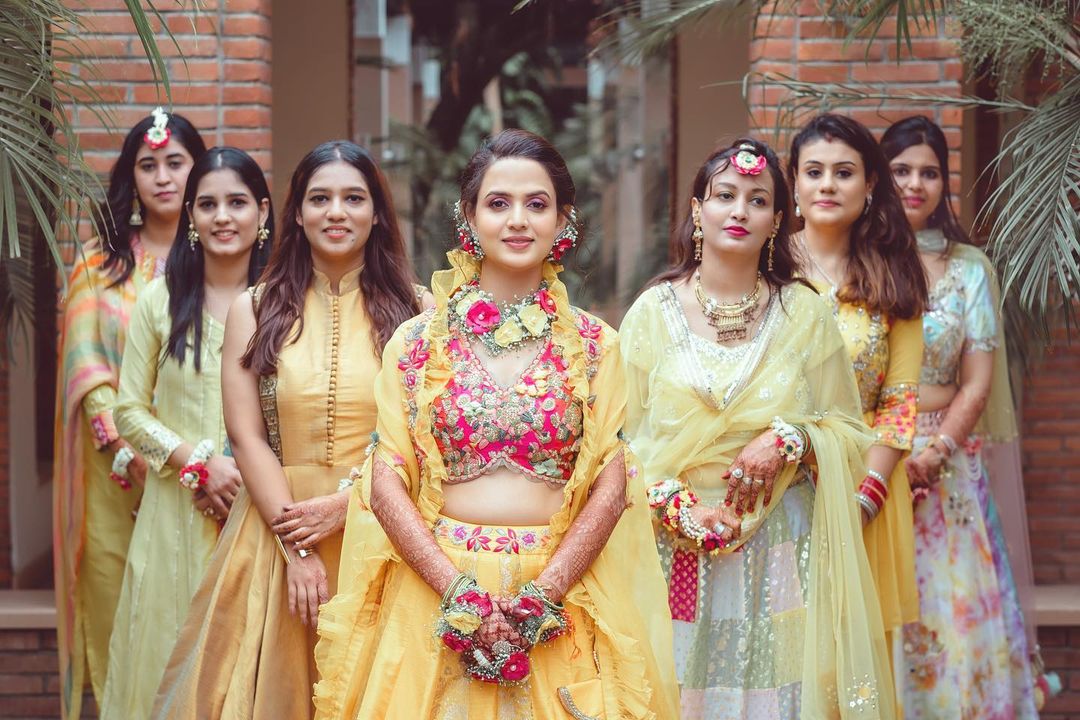 Haldi photoshoot poses - haldi pics ideas with sisters and friends - haldi poses with sister