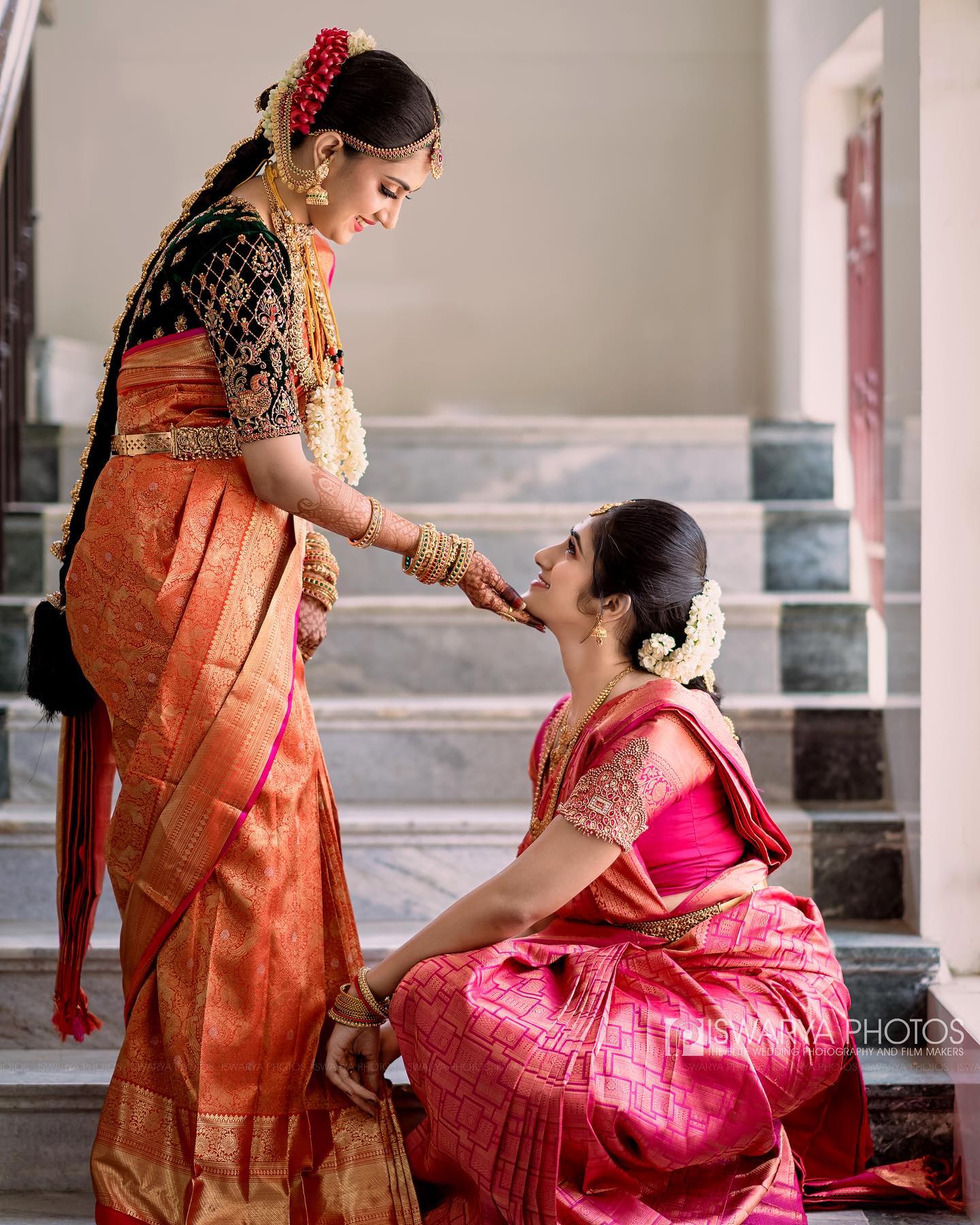 bride in orange kanjeevaram and contrast blouse