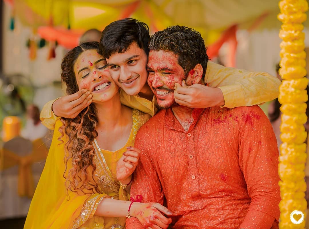 haldi photoshoot ideas for bride and groom with brother