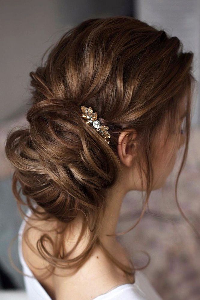 side-bun-hairstyle-for-gown | WedAbout