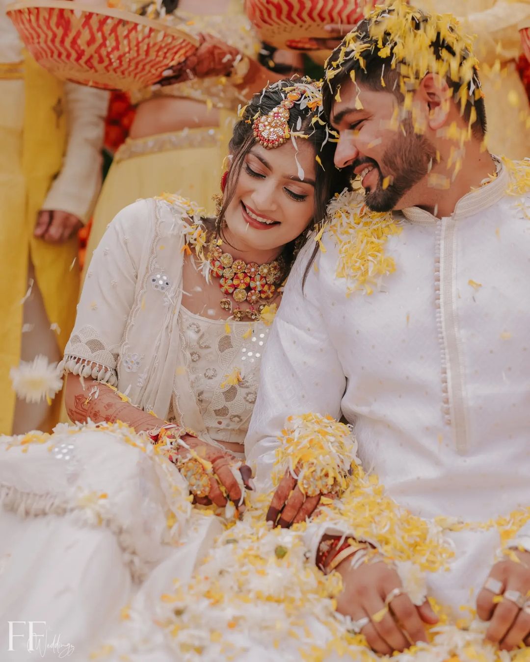 Haldi photoshoot poses for bride and groom- haldi pics of bride and groom