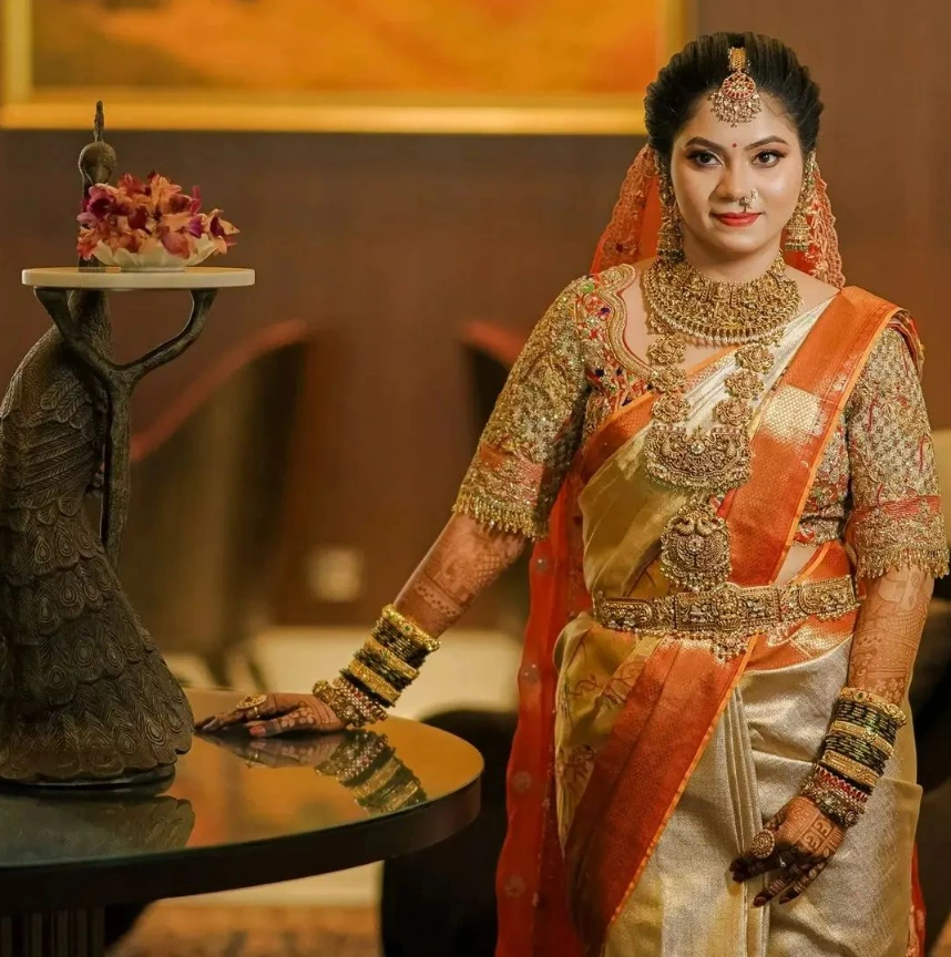 south Indian orange-golden wedding saree idea/look